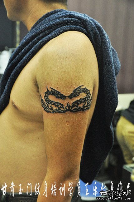 武汉专业纹身学校介绍来自甘肃玉门纹身学员王乐打造的图腾龙纹身作品
