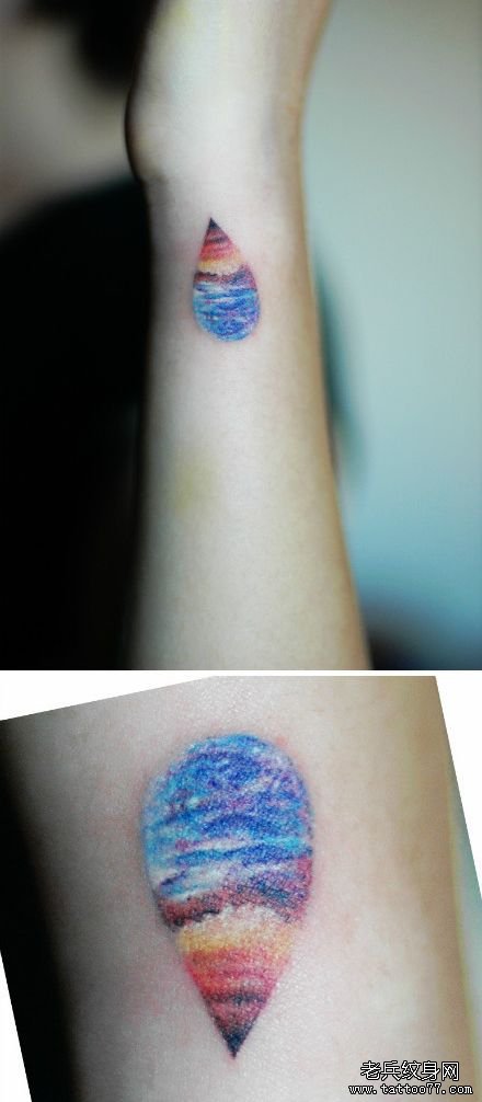 女生手臂一款时尚另类的水滴纹身图案