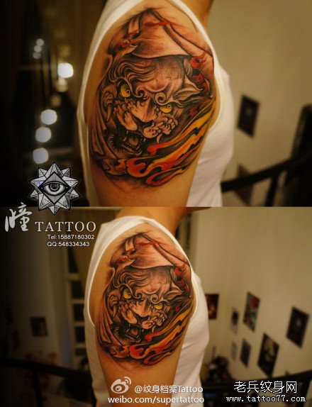 男人手臂霸气的唐狮子纹身图案