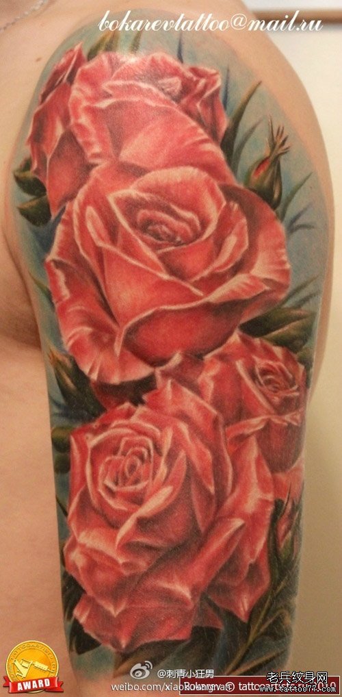 手臂漂亮精美的粉色玫瑰花纹身图案_武汉纹身