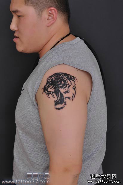 武汉专业纹身:大臂图腾虎头纹身图案作品