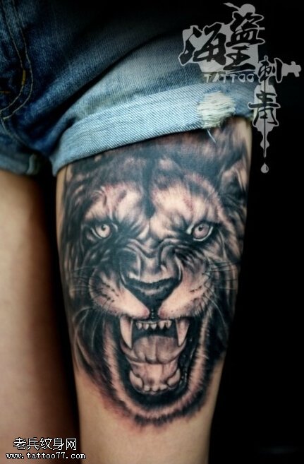 女性腿部狮子纹身图案由武汉最好的刺青店提供