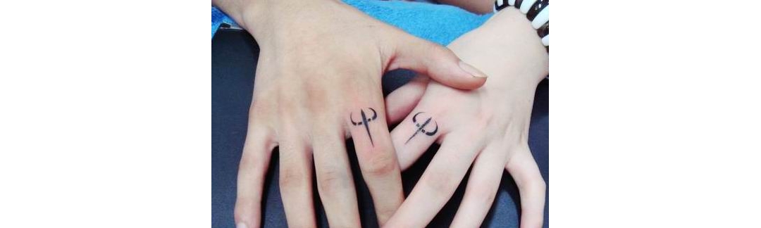 一款时尚的手指情侣戒指纹身图片