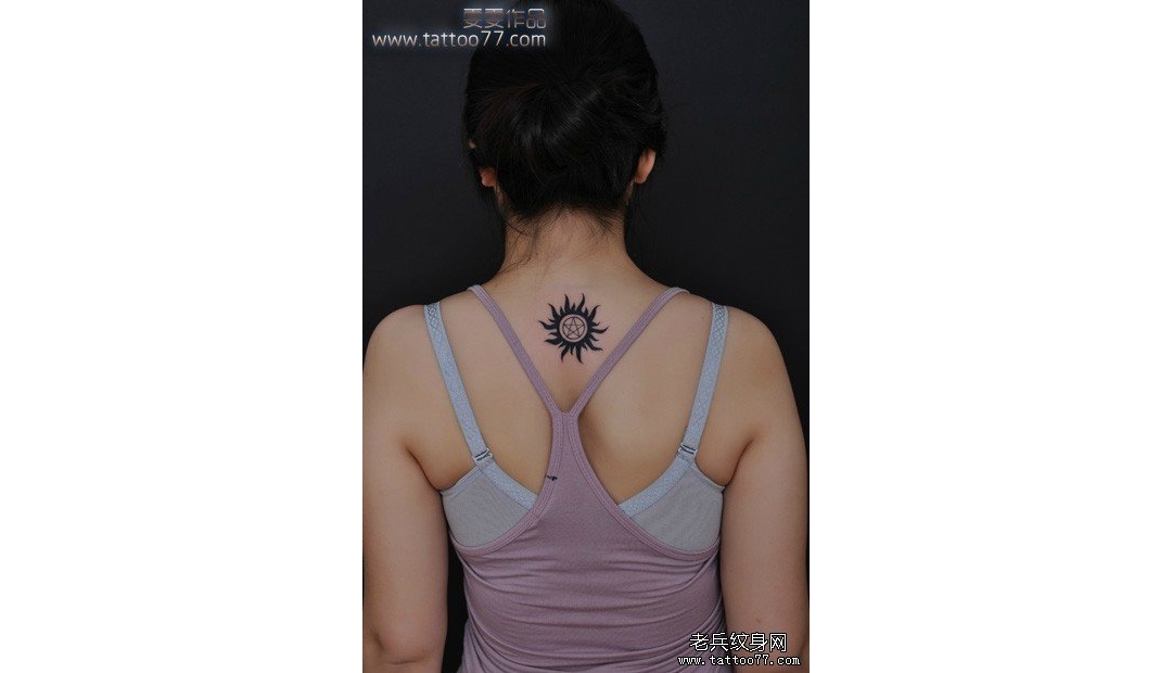 武汉专业纹身店：经典的颈部图腾太阳纹身图案作品
