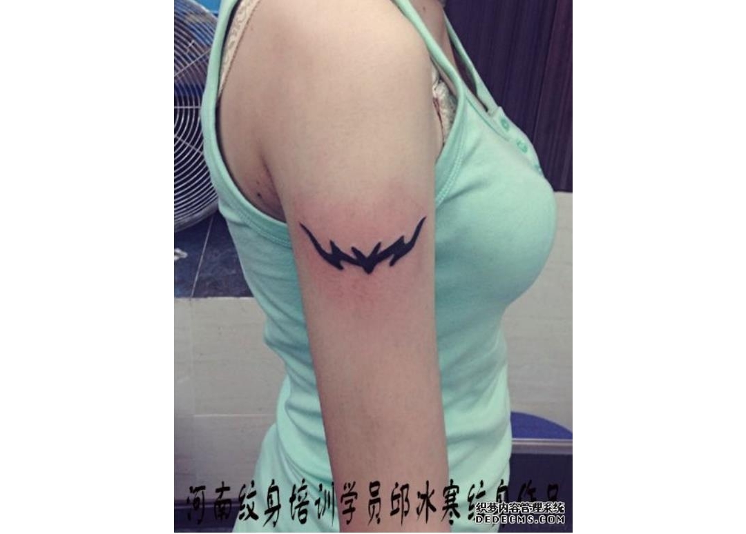 河南纹身学员在校期间第一次上皮肤实操大臂图腾纹身作品