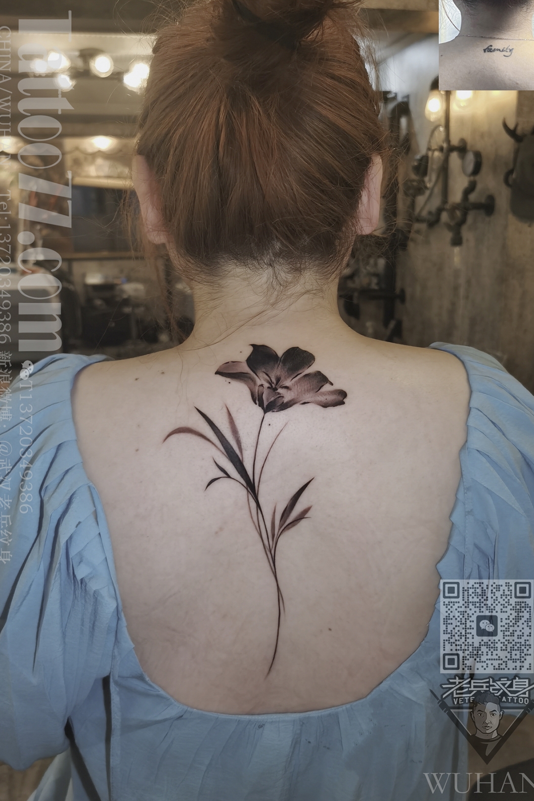 美女后背脊椎花卉纹身作品