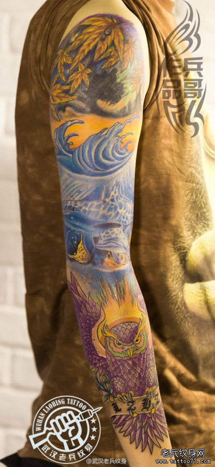 花臂海洋世界与猫头鹰相结合的纹身作品及寓意
