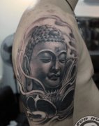 一款男人手臂经典的佛头纹身图案