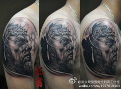 手臂一款黑白耶稣肖像纹身图案