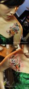 女生肩膀处可爱时尚的猫咪纹身图案
