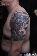 武汉老兵打造的大臂貔貅纹身图案作品恢复后