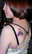 彰显个性的紫色蝎子纹身图案作品及意义