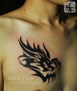 胸口图腾龙头纹身图案作品由武汉专业纹身店出品及含义
