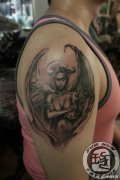 男生手臂超酷漂亮的恶魔美女纹身图案