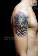 手臂象神纹身图案作品由武汉纹身店疯子制作