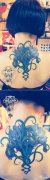 女生后背唯美时尚的鸢尾花纹身图案
