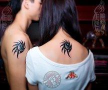 武汉老兵纹身店纹身师打造的情侣图腾太阳纹身作品及意义