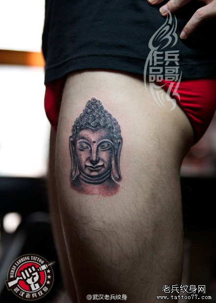 武汉老兵纹身店兵哥制作的大腿佛头纹身作品及含义