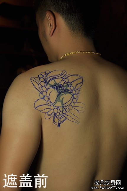 武汉专业纹身店喻迪打造的佛珠莲花纹身作品及寓意遮盖旧纹身图案