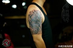 武汉专业纹身店兵哥修改的大臂欧美骷髅纹身作品