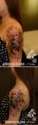 女生手臂精美时尚的玫瑰花纹身图案