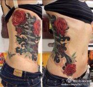 美女侧腰很酷经典的机械与玫瑰纹身图案
