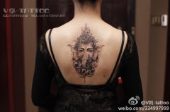 女生后背时尚唯美的象神纹身图案