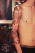 武汉老兵纹身店兵哥制作的花臂线条象神鲤鱼纹身作品