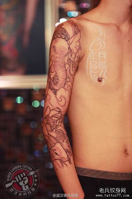 武汉老兵纹身店兵哥制作的花臂线条象神鲤鱼纹身作品
