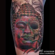 潮流很酷的一半佛头一半骷髅纹身图案