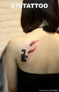 武汉纹身店推荐一款金鱼纹身图案