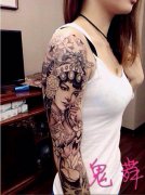 一款女性手臂花旦纹身图案由武汉纹身店推荐