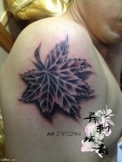 男人胳膊个性树叶纹身图案