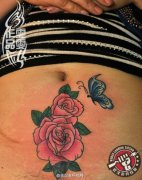 武汉老兵纹身店雯雯打造的玫瑰花蝴蝶纹身作品遮盖疤痕