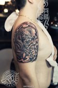 武汉专业纹身店兵哥打造的大臂牛魔王纹身作品