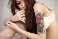 武汉最好的刺青店推荐一款女性手臂彩色纹身图案