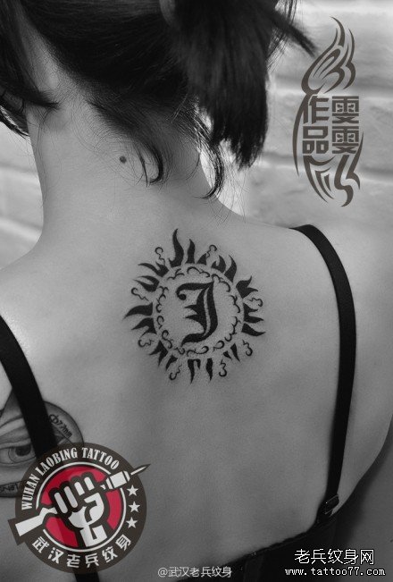 武汉老兵纹身店纹身师打造的情侣颈部图腾太阳纹身作品