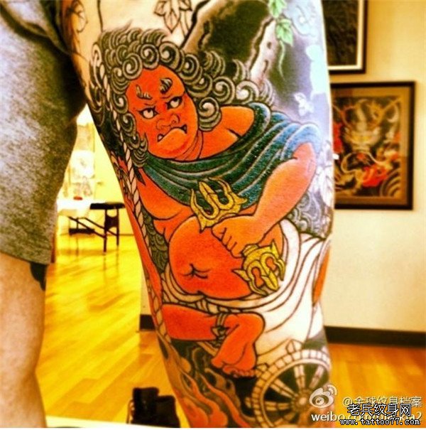 腿部彩色不动明王纹身图案由武汉纹身店推荐