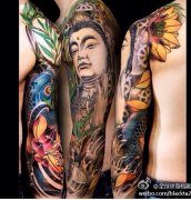 武汉最好的纹身店推荐一款传统彩色观音鲤鱼花臂纹身图案