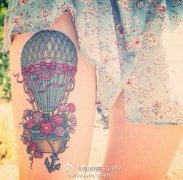 女性腿部彩色热气球纹身图案