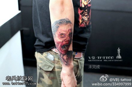 狰狞满血人面纹身图案
