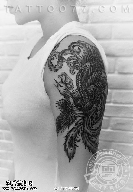 大臂凤凰纹身作品由武汉最好的女纹身师制作