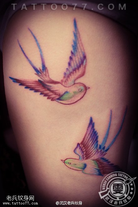 大腿小鸟纹身作品由武汉专业纹身店制作