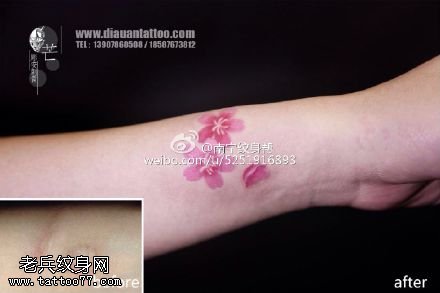 遮盖伤疤清新的桃花纹身图案