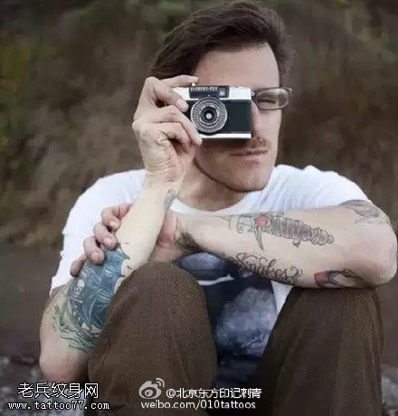 时尚摄影师纹身图案