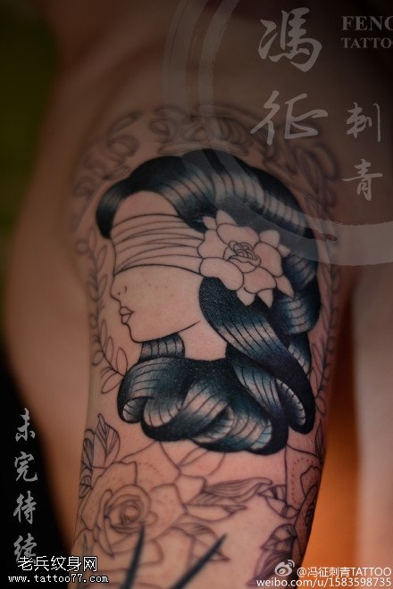 待续的美女图腾纹身图案