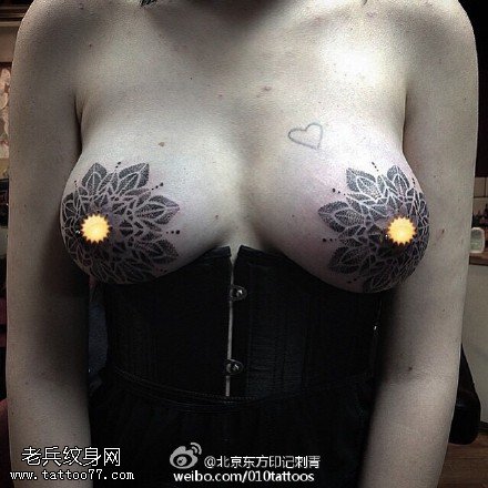 咪咪上的梵花纹身图案