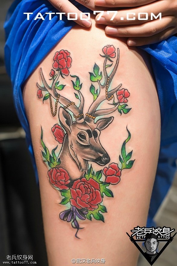 大腿玫瑰鹿纹身图案作品
