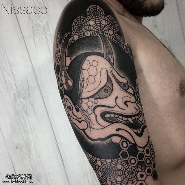 大臂上经典的般若纹身图案