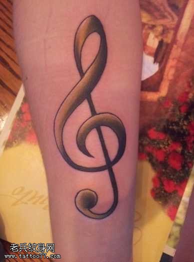 手臂音符纹身图案